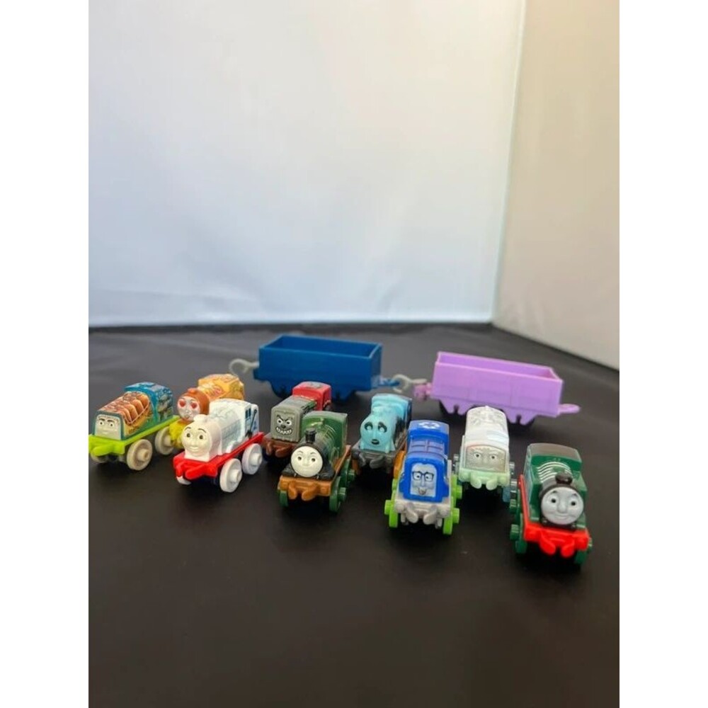 (9) Thomas The Train Minis and (2) Rolling Carts